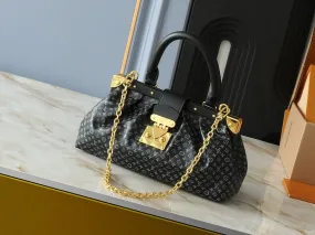 LV Nanogram Embossed Leather Clutch