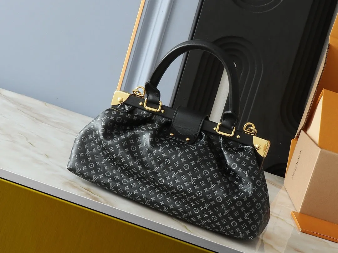 LV Nanogram Embossed Leather Clutch