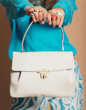 Vintage handbag with oval closure